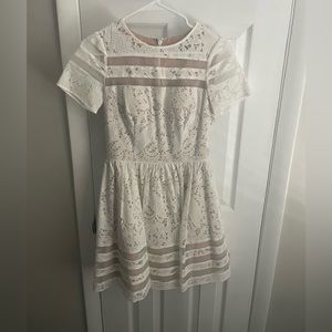 Bloomingdale’s Aqua brand. Lace dress with sheer details.